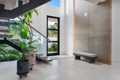 A masterpiece of modern waterfront living, this nearly new 2024 - photo 11