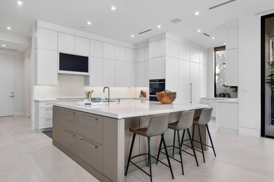 A masterpiece of modern waterfront living, this nearly new 2024 - photo 21