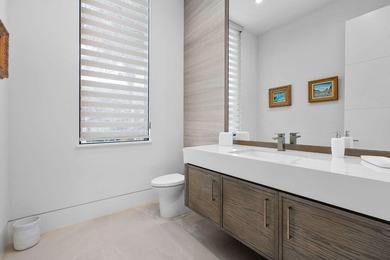 A masterpiece of modern waterfront living, this nearly new 2024 - photo 35