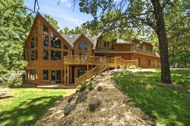 Custom built and thoughtfully designed, this stunning log home - photo 2
