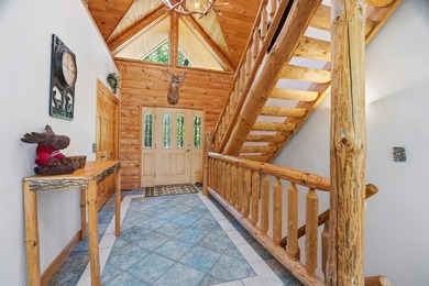 Custom built and thoughtfully designed, this stunning log home - photo 6