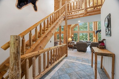 Custom built and thoughtfully designed, this stunning log home - photo 7