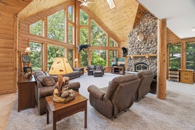 Custom built and thoughtfully designed, this stunning log home - photo 9