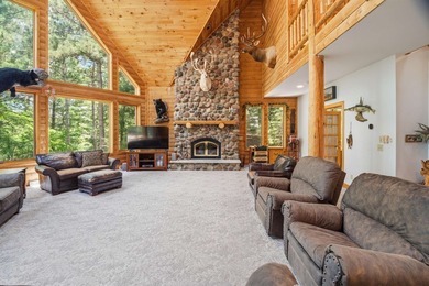 Custom built and thoughtfully designed, this stunning log home - photo 10