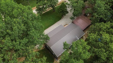 Escape to the lake with this charming 3-bedroom, 1.5-bath cabin - photo 3