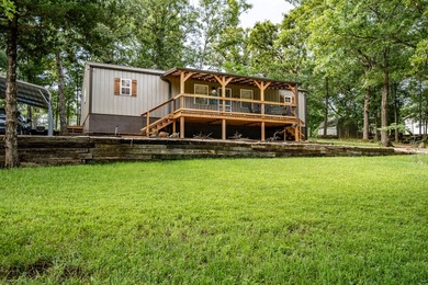Escape to the lake with this charming 3-bedroom, 1.5-bath cabin - photo 4