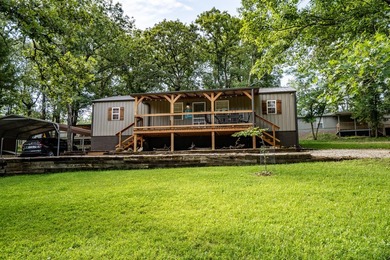 Escape to the lake with this charming 3-bedroom, 1.5-bath cabin - photo 5