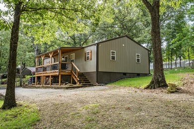 Escape to the lake with this charming 3-bedroom, 1.5-bath cabin - photo 6
