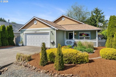 Rockaway Beach home on quiet street backs up to a pond to take - photo 1