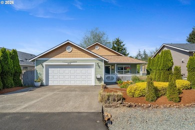 Rockaway Beach home on quiet street backs up to a pond to take - photo 2