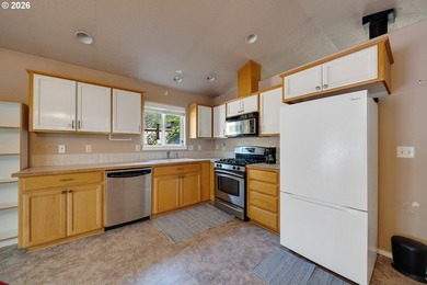 Rockaway Beach home on quiet street backs up to a pond to take - photo 10