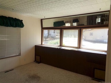 Affordable Lakeside Getaway with Add-On Space & Great Potential! - photo 11