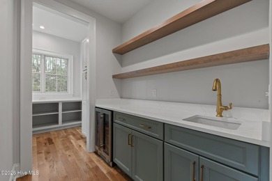 Nestled on a quiet cul-de-sac in Forest Creek Golf Club, this - photo 19