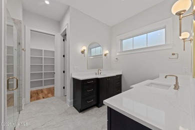 Nestled on a quiet cul-de-sac in Forest Creek Golf Club, this - photo 24