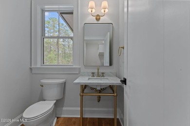 Nestled on a quiet cul-de-sac in Forest Creek Golf Club, this - photo 31