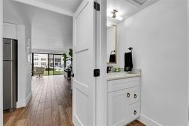 THIS STUNNING GROUND FLOOR UNIT HAS BEEN TOTALLY RENOVATED IN