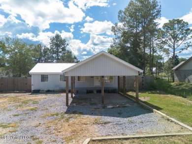 Lake Home For Sale in Saucier, Mississippi