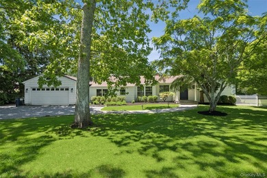 Set on a just-shy acre in the coveted estate section of - photo 1