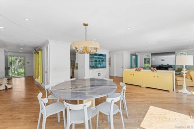 Set on a just-shy acre in the coveted estate section of - photo 7