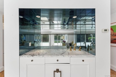 Set on a just-shy acre in the coveted estate section of - photo 10