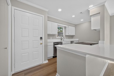 Enjoy effortless lakefront living in this beautifully remodeled - photo 2