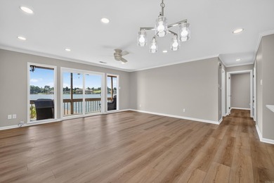 Enjoy effortless lakefront living in this beautifully remodeled - photo 10