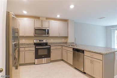 This 1,286-square-foot townhouse at 6340 Brant Bay Blvd #104 was - photo 2