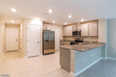 This 1,286-square-foot townhouse at 6340 Brant Bay Blvd #104 was - photo 3