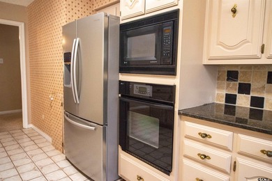 Lakefront classic! Brick ranch style home is ready for