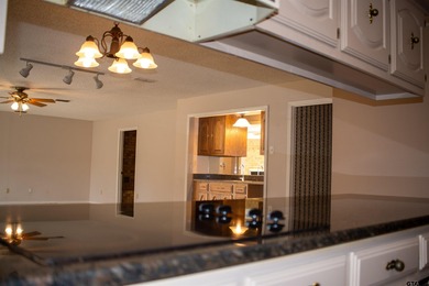 Lakefront classic! Brick ranch style home is ready for