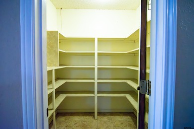 Lakefront classic! Brick ranch style home is ready for