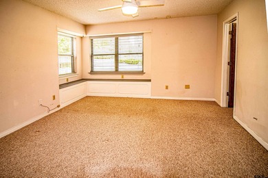 Lakefront classic! Brick ranch style home is ready for