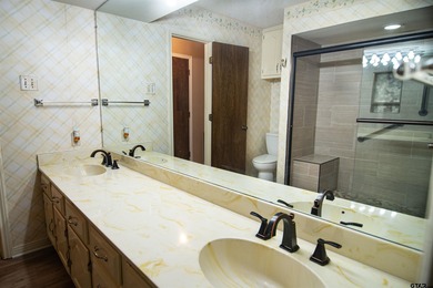 Lakefront classic! Brick ranch style home is ready for