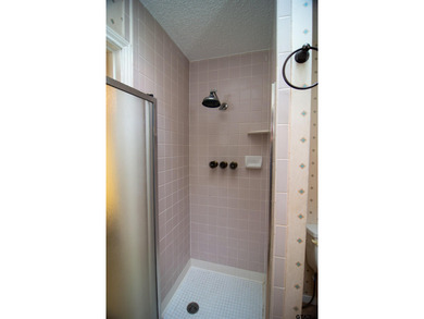 Lakefront classic! Brick ranch style home is ready for