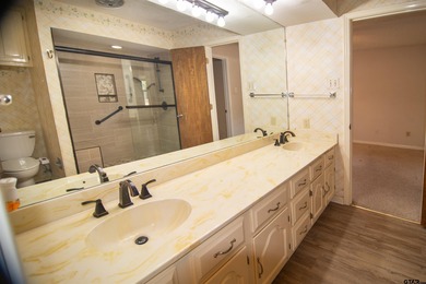 Lakefront classic! Brick ranch style home is ready for