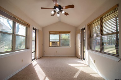 Lakefront classic! Brick ranch style home is ready for