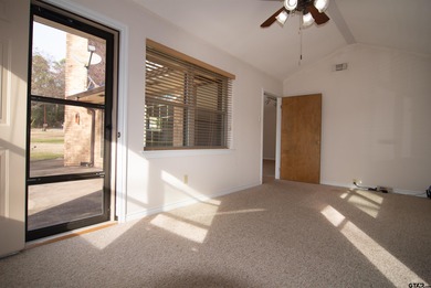 Lakefront classic! Brick ranch style home is ready for