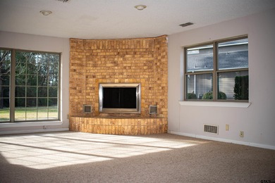 Lakefront classic! Brick ranch style home is ready for