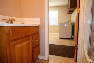 Lakefront classic! Brick ranch style home is ready for