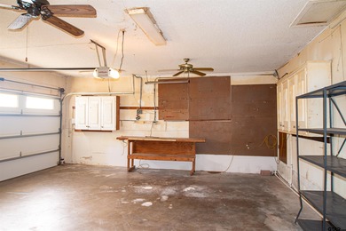 Lakefront classic! Brick ranch style home is ready for