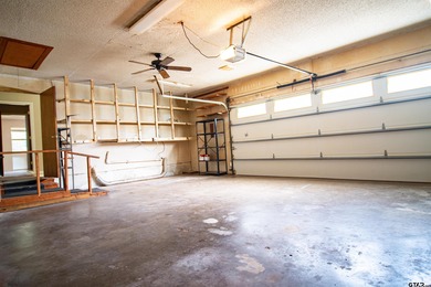 Lakefront classic! Brick ranch style home is ready for