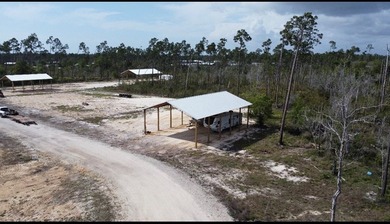 This 1 acre lot is only 4 miles from the beautiful white sands - photo 3