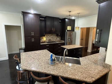 Beautiful custom built home on #15 Fairway in Sage Meadow with 5 - photo 7