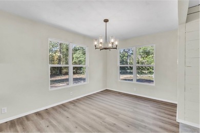 Discover your newly remodeled retreat in the coveted *Land of - photo 13