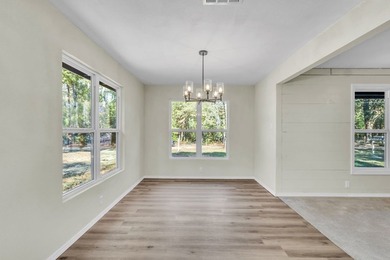 Discover your newly remodeled retreat in the coveted *Land of - photo 14