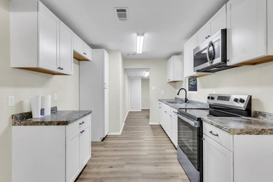Discover your newly remodeled retreat in the coveted *Land of - photo 16