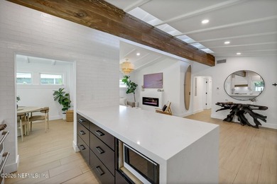 Thoughtfully renovated inside and out, this Neptune Beach home - photo 17