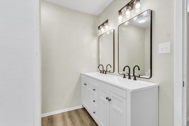 Discover your newly remodeled retreat in the coveted *Land of - photo 19
