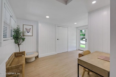 Thoughtfully renovated inside and out, this Neptune Beach home - photo 27