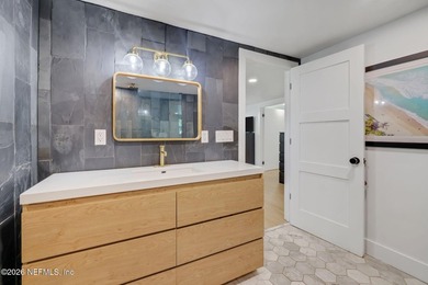 Thoughtfully renovated inside and out, this Neptune Beach home - photo 33